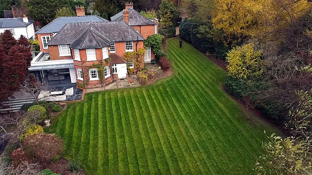 A frontage and driveway re-levelled to clear standing water.