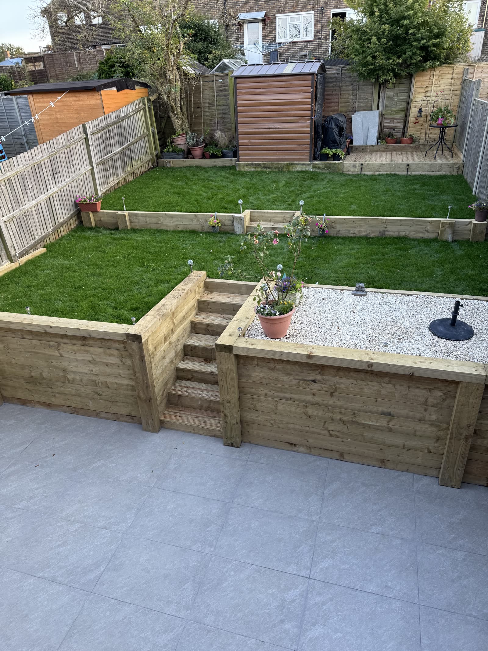 A tired terrace garden rebuilt into an oasis of tranquility.