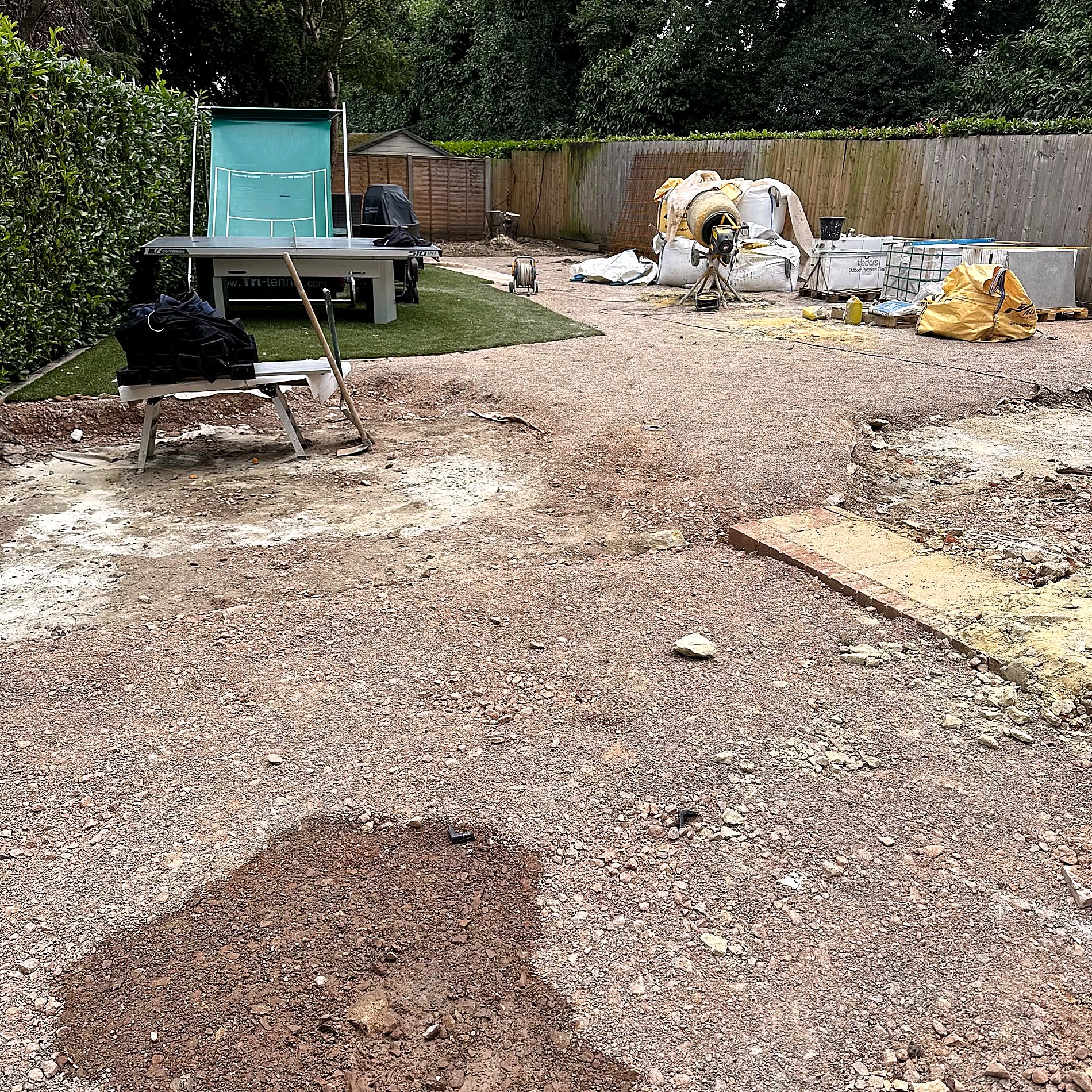 Changing levels handled with paved steps and timber retaining.